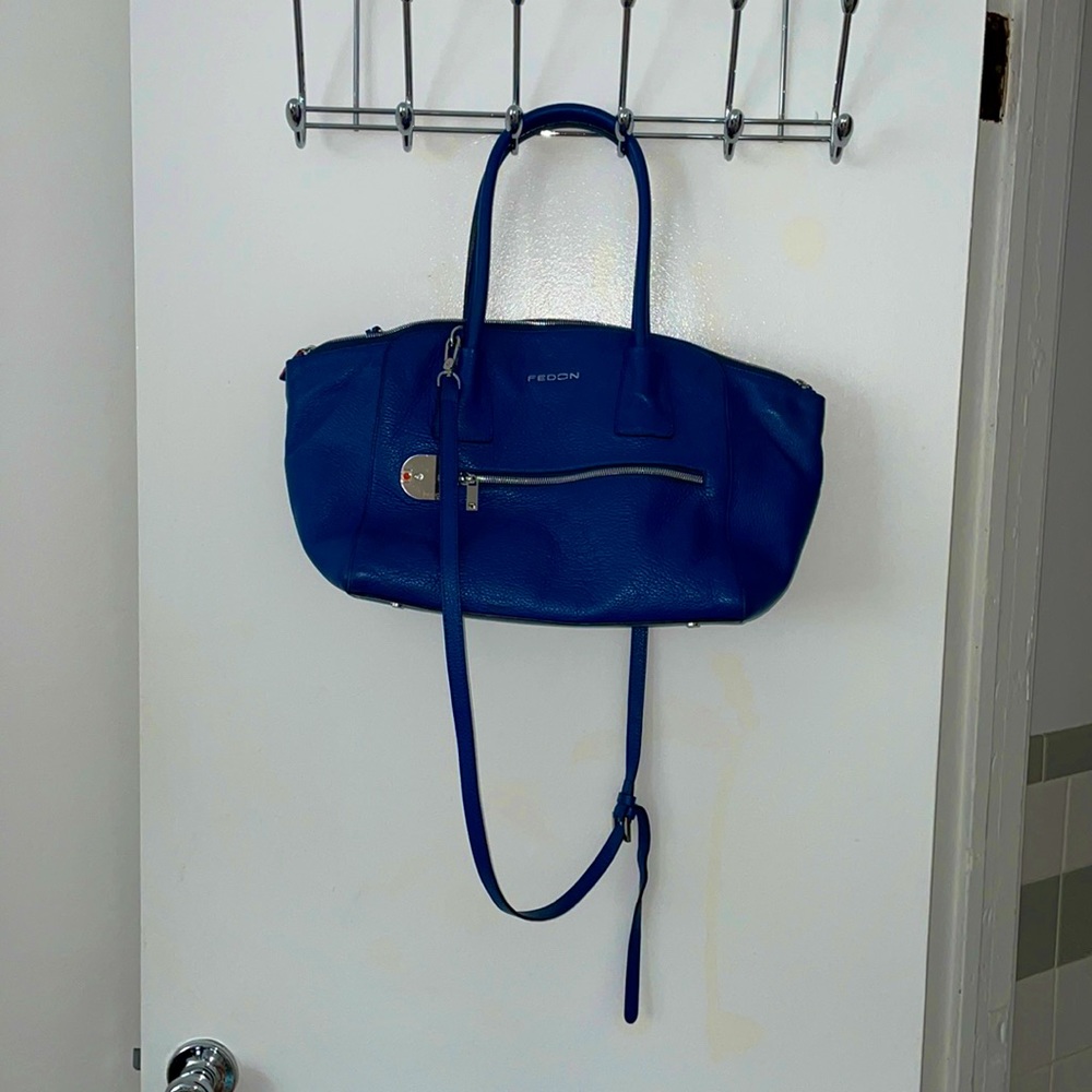 Genuine Italian Leather top handle purse .